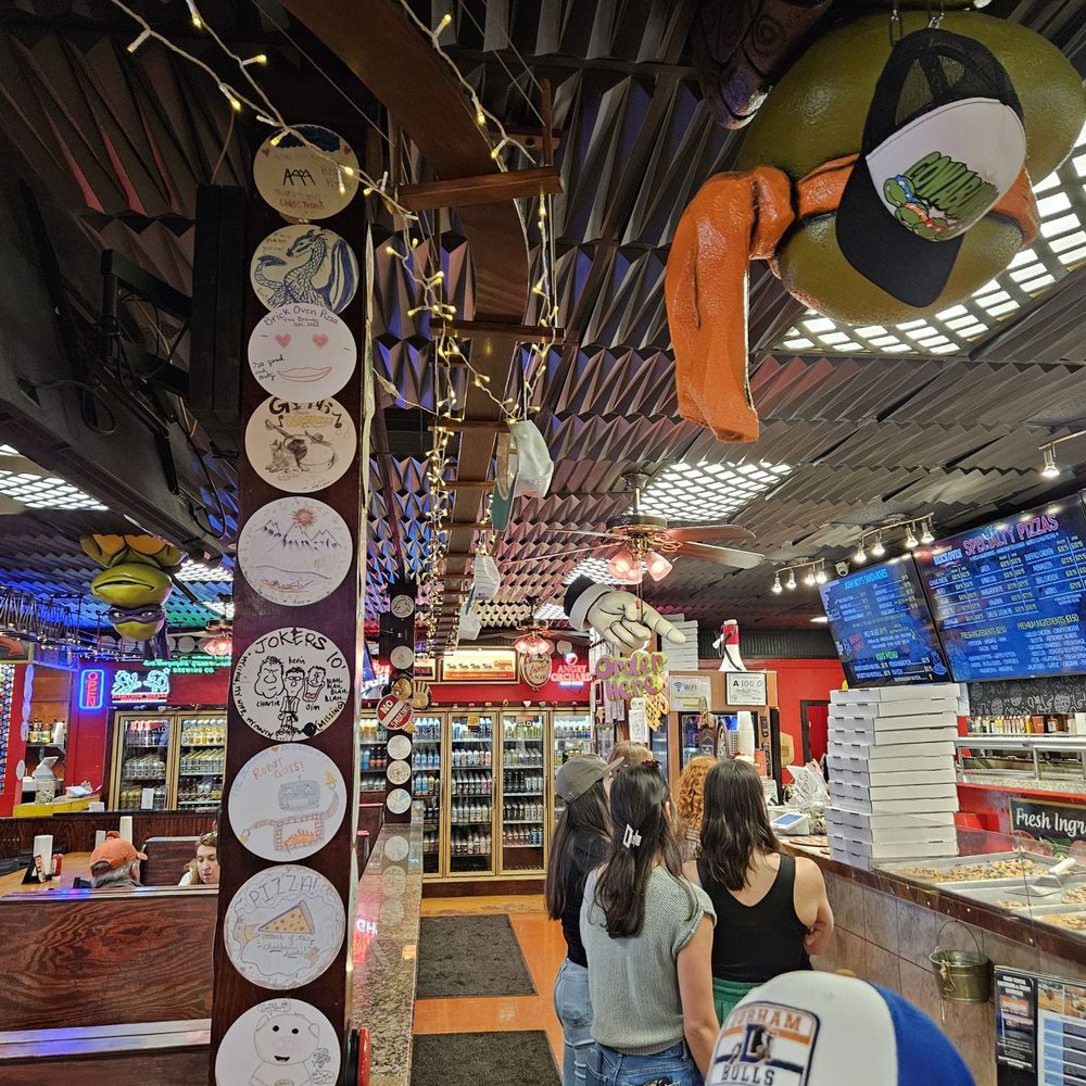 Famous Brick Oven Pizzeria - Seperate line for alcoholic beverage orders by the beverage wall - Pizza Near Me - Beech Mountain, North Carolina Famous Brick Oven Pizzeria - Seperate line for alcoholic beverage orders by the beverage wall - Pizza Near Me - Beech Mountain, North Carolina