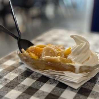 Biff Buzby's Burgers - Cobbler is a must have. Takes you back to the childhood delight of warm pie and swirly tipped ice cream. - Burgers Near Me - Live Oak, Texas Biff Buzby's Burgers - Cobbler is a must have. Takes you back to the childhood delight of warm pie and swirly tipped ice cream. - Burgers Near Me - Live Oak, Texas