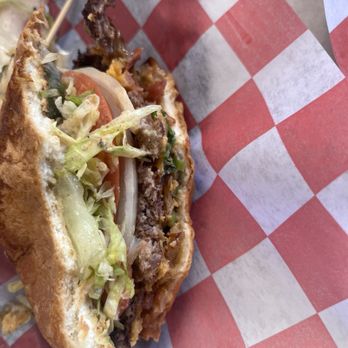 Bonehead Burger Co - Bonehead burger, half eaten. Becuase I couldn't wait! Yum! - Burgers Near Me - San Diego, California