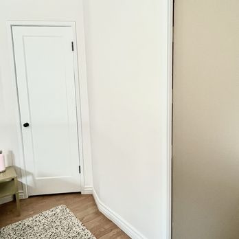 Lvl General Contracting - Inside the rounded hallway, paint job and new trims - General Contractors Near Me
