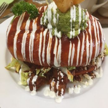 Frida's Breakfast & Lunch - Pambazo - telera roll with chorizo, red potato in guajillo sauce, queso fresco and guacamole - Breakfast & Brunch Near Me - Evanston, Illinois