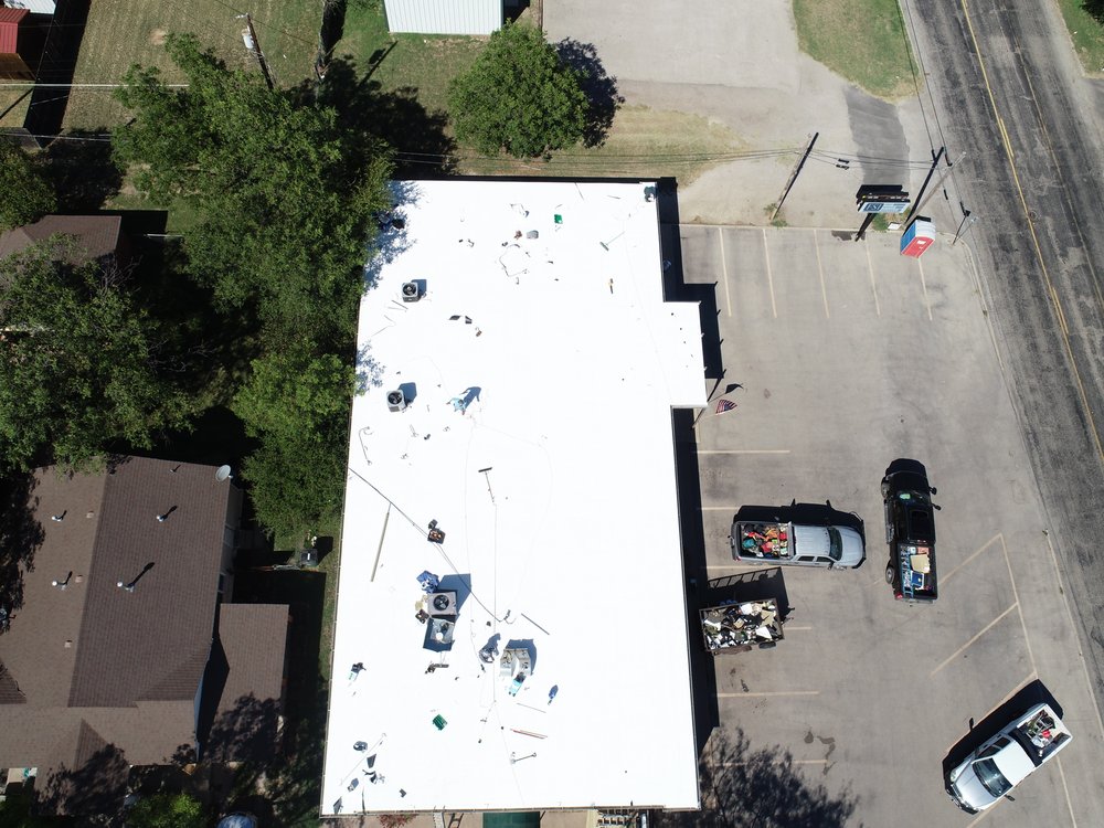 Slide of Kent Elliott Roofing