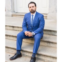 The Mark Kachhi Law Firm - Mark sitting on the courthouse steps