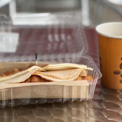 Risen Bakery & Grill - Croissant  breakfast sandwich n fresh coffee
