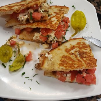 Chris' Taverna - The freshest tomatoes with feta cheese, grilled onions inside a warm, soft pita.....ask for a side of taziki sauce this is HEAVEN!!!! - Greek Near Me - Boynton Beach, Florida Chris' Taverna - The freshest tomatoes with feta cheese, grilled onions inside a warm, soft pita.....ask for a side of taziki sauce this is HEAVEN!!!! - Greek Near Me - Boynton Beach, Florida