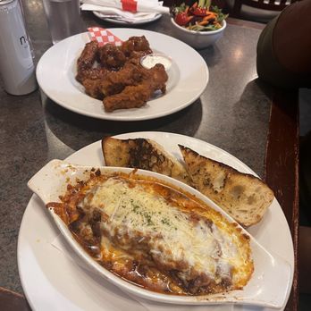 Shady Tree Neighborhood Pub - Chicken wings and lasagna - Pubs Near Me - Squamish, British Columbia Shady Tree Neighborhood Pub - Chicken wings and lasagna - Pubs Near Me - Squamish, British Columbia