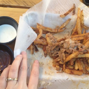 Arizona Wilderness Brewing - Forgot to take a pic before devouyering 1/2 the pork and fries... yummy snack. FLYIN' BELGIAN PIG IN BEER CHEESE. - Breweries Near Me - Gilbert, Arizona