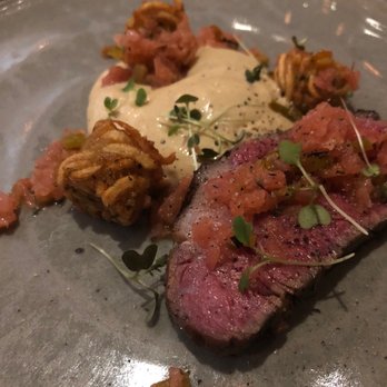 Barley Swine - Ribeye with a delectable bone marrow sauce and beef fat tater tot. - New American Near Me - Austin, Texas Barley Swine - Ribeye with a delectable bone marrow sauce and beef fat tater tot. - New American Near Me - Austin, Texas