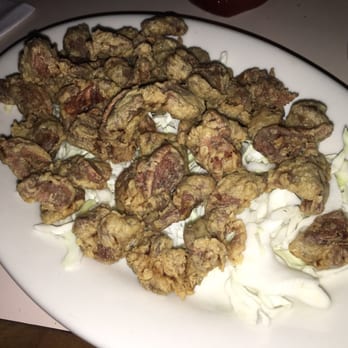 Anyplace Cocktail Lounge - Fried gizzards. Crispy and lean. Good little bites with your beer. - Lounges Near Me - Honolulu, Hawaii