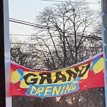 U Dumpling House - a sign in a window - Dim Sum Near Me - Framingham, Massachusetts
