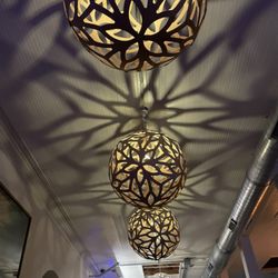 Meridian - The amazing ceiling fixtures that cast light so beautifully.