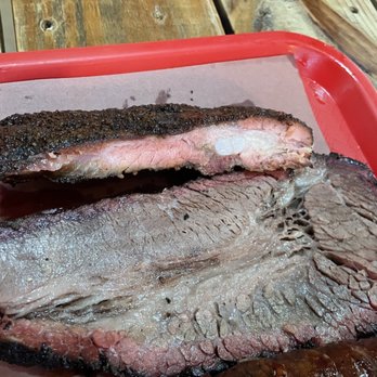 Cattleack Barbeque - Close up of rib and brisket (lean on top, fatty on bottom). - Barbeque Near Me - Dallas, Texas