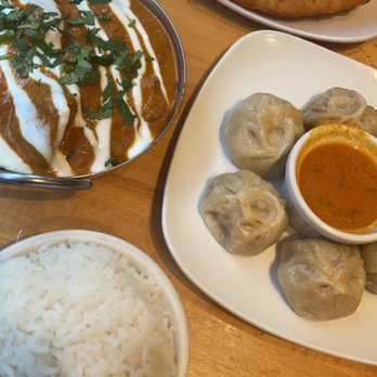 Namaste Café - Top to bottom: bhatura, lamb mamacha, creamy masala curry with chicken (rice). - Indian Near Me - Minneapolis, Minnesota Namaste Café - Top to bottom: bhatura, lamb mamacha, creamy masala curry with chicken (rice). - Indian Near Me - Minneapolis, Minnesota