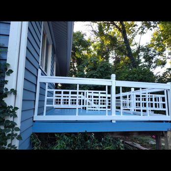 Luxe Renovations - a white railing on a blue house - General Contractors Near Me Luxe Renovations - a white railing on a blue house - General Contractors Near Me