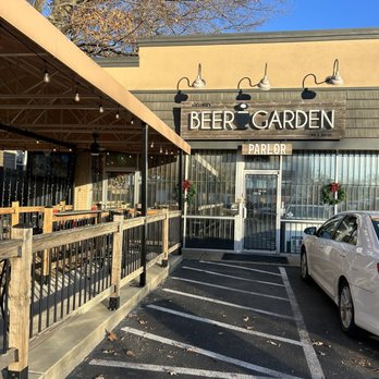 Lucchesi's Beer Garden - a car parked outside - Beer Gardens Near Me - Memphis, Tennessee