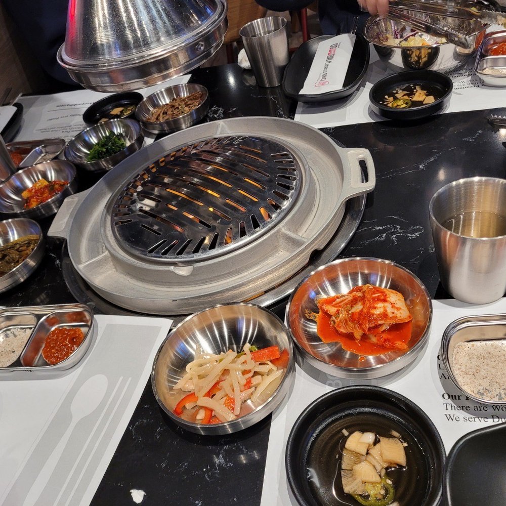 Cow Wow Korean BBQ - Servings for 4 Banchan Spread - Korean Near Me - Suwanee, Georgia Cow Wow Korean BBQ - Servings for 4 Banchan Spread - Korean Near Me - Suwanee, Georgia