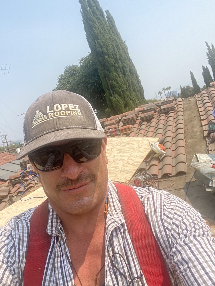 Slide of Victor A. Lopez Roofing