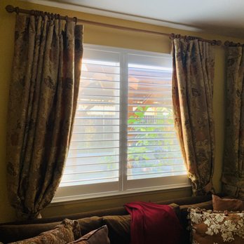 Magna Shutters - Downstairs living room with bottom half and top half open. - Shutters Near Me