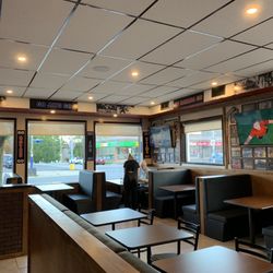 Wing House - Inside the restaurant, waiting for our takeout order. Patience is a virtue!!