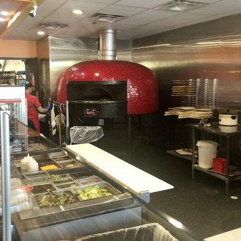 Uncle Maddios Pizza - a pizza oven in a restaurant - Pizza Near Me - Wichita, Kansas Uncle Maddios Pizza - a pizza oven in a restaurant - Pizza Near Me - Wichita, Kansas