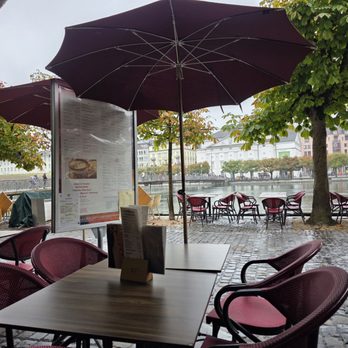 La Barca - A rainy and beautiful view of the Reuss from the table - Italian Near Me - Luzern, LU La Barca - A rainy and beautiful view of the Reuss from the table - Italian Near Me - Luzern, LU