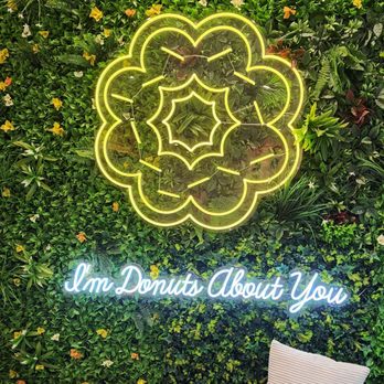 Mochinut - University Village - Feature wall by entrance (1/3/24) - Bubble Tea Near Me - Seattle, Washington