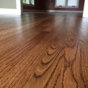 Surewood Floors - a closeup of a hardwood floor - Flooring Near Me Surewood Floors - a closeup of a hardwood floor - Flooring Near Me