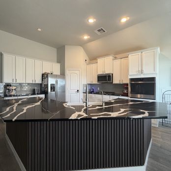 Texas Greatest Remodelers - Wood paneling added to front - General Contractors Near Me - Houston, Texas Texas Greatest Remodelers - Wood paneling added to front - General Contractors Near Me - Houston, Texas
