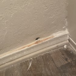La Scala Apartment Homes - The hole they never patched after accidentally punching into my second bathroom because of Leak 2