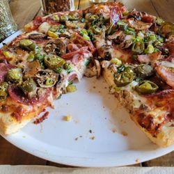 Westside Ale Works - OMG, the space needle with house smoked bacon, pepperoni, mushroom, spring onions, and addition of jalapeno slices. So good!