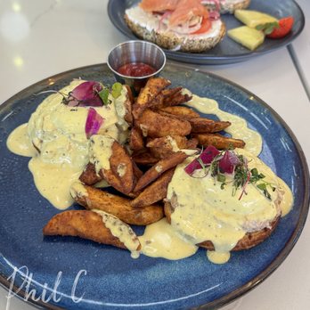 OEB Kitchen - Newport Beach - Crab Benny with herb-seasoned wedge fries. So Good! - Breakfast & Brunch Near Me - Newport Beach, California OEB Kitchen - Newport Beach - Crab Benny with herb-seasoned wedge fries. So Good! - Breakfast & Brunch Near Me - Newport Beach, California