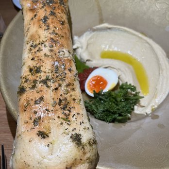 Dagon - hummus with complimentary bread - Bars Near Me - New York, New York