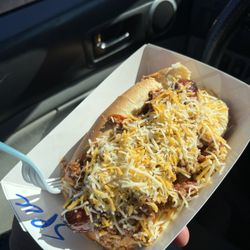 Snappy Dogs - Spicy beef with hot chili, cheese, and onions under dog