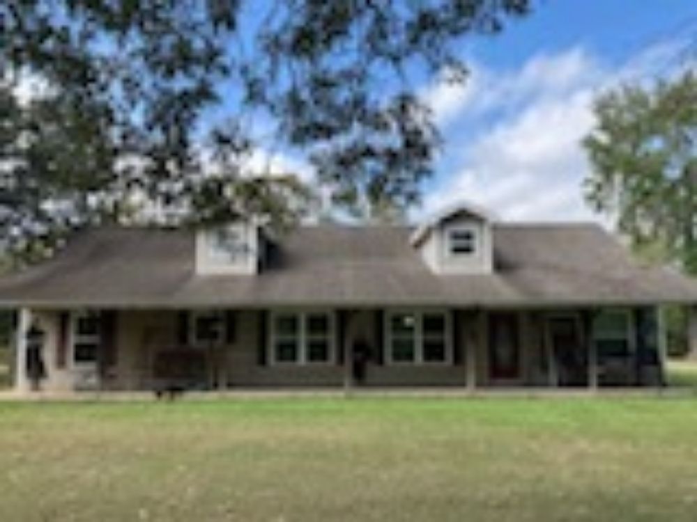 Slide of Estate Roofing