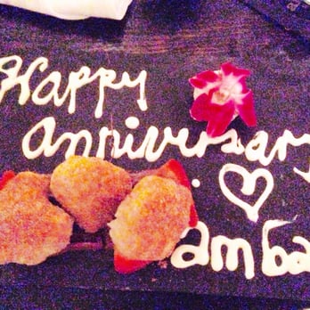 AMBAR Restaurant, Capitol Hill - Cinnamon beignets with Nutella and cream. What a wonderful touch of writing! - Modern European Near Me - Washington, DC, District of Columbia
