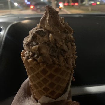 Twistee Treat - Jones - a hand holding a cone of ice cream - Ice Cream & Frozen Yogurt Near Me - Houston, Texas Twistee Treat - Jones - a hand holding a cone of ice cream - Ice Cream & Frozen Yogurt Near Me - Houston, Texas
