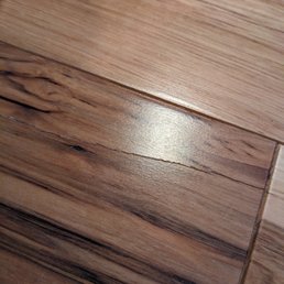 Phoenix Construction - Cracked floors where they were installed too tightly together in some places - General Contractors Near Me - Lake Forest Park, Washington