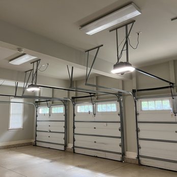 Garage Door Specialist - Three new garage door openers. They are super quiet! - Garage Door Services Near Me - Raleigh, North Carolina