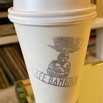 Cafe Bambino - a cup of coffee on a table - Coffee & Tea Near Me - Seattle, Washington