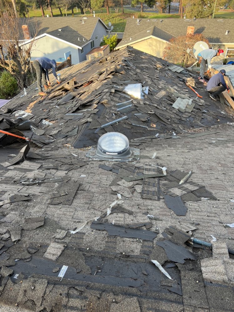 Slide of Pro Gutters cleaning and roofing 