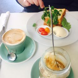 Deluca Cafe - Savoury brioche with tulip flat white and ... an affogato.