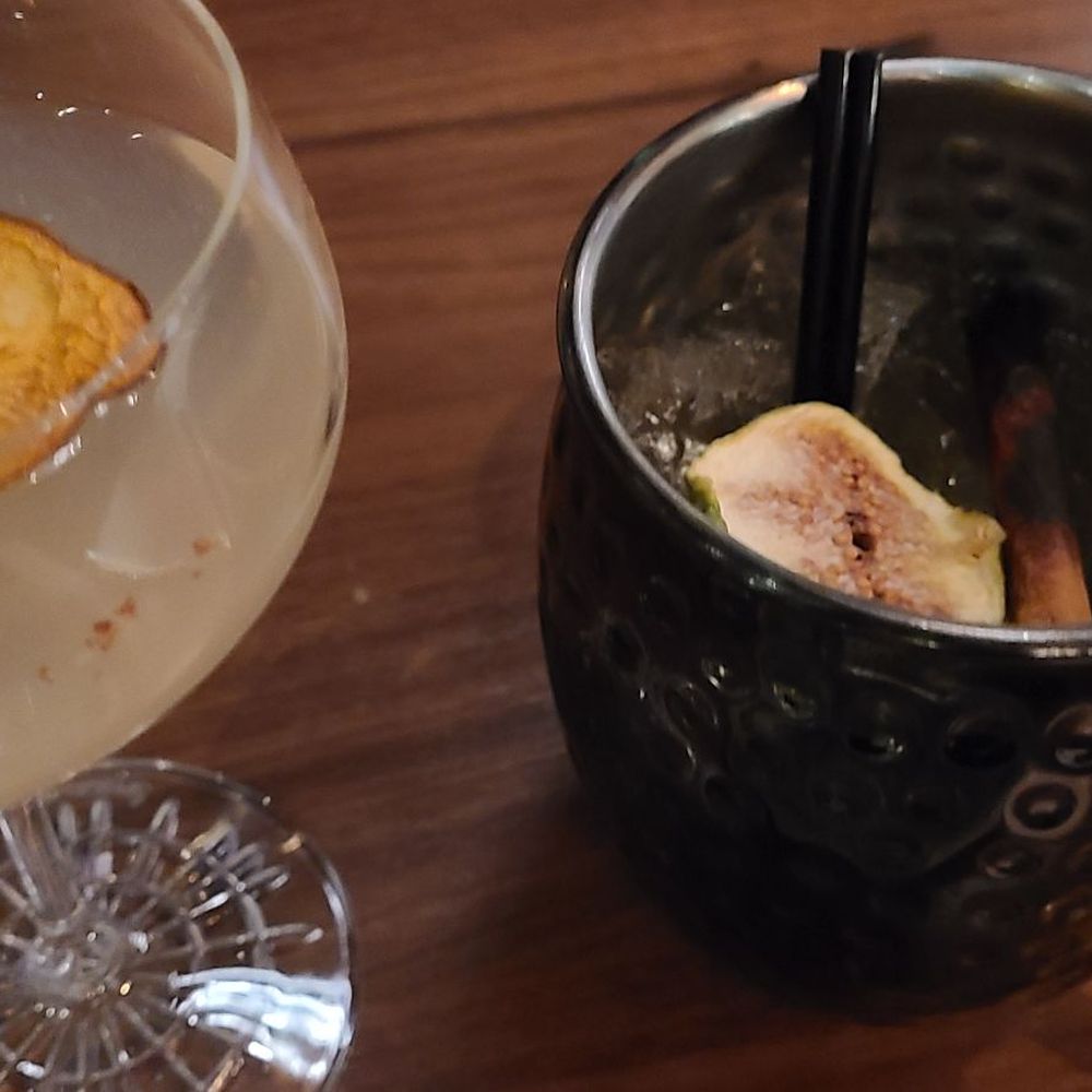 Ramsay's Kitchen - Cocktails. Left: Margarita w Pear syrup. Right: Fig mule - New American Near Me - Las Vegas, Nevada