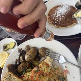 Omelette with potatoes, toast & a pancake Omelette with potatoes, toast & a pancake