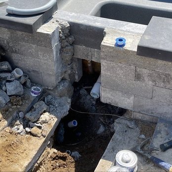 JAS Aquatics - This is the back of the tub they had to break after just installing the bricks. - Pool & Hot Tub Service Near Me - Huntington Station, New York