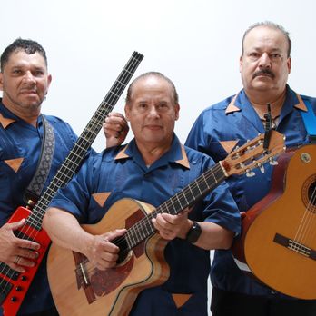 Trio Mariachi Tepatitlan - A relaxed shot from our Summer 2025 studio session -- perfect for casual events and backyard parties too. Book Trio Tepatitlan today! - Musicians Near Me