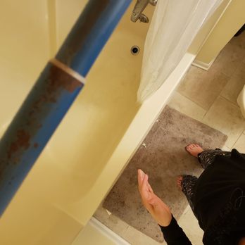 Resort Realty - rust on top of shower curtain rod. - Real Estate Agents Near Me - Corolla, North Carolina