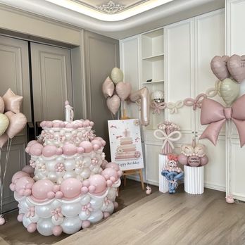 Glow Balloon Design - 5ft tall balloon birthday cake - Balloon Services Near Me