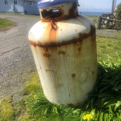 Amerigas - This is the rusty propane tank Amerigas won't pick up from in front of a house I bought after 3 months ans they say 4 months wait