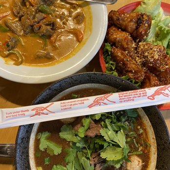 Too Thai Street Eats - C1. Panang Curry G10. Too Thai Chicken Wings N5. Mama Pad Ke Mow Ta Ley Noodles all with spice level of 4 - Thai Near Me - Carrollton, Texas Too Thai Street Eats - C1. Panang Curry G10. Too Thai Chicken Wings N5. Mama Pad Ke Mow Ta Ley Noodles all with spice level of 4 - Thai Near Me - Carrollton, Texas