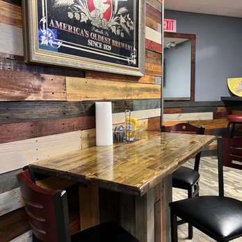 Pallet Bar and Grill - a table and chairs - American Near Me - Fort Walton Beach, Florida Pallet Bar and Grill - a table and chairs - American Near Me - Fort Walton Beach, Florida